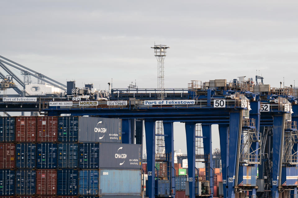 Cranes sit idle at the Port of Felixstowe in Suffolk, Britain's biggest and busiest container port, as members of the Unite union man a picket line at the entrances after backing industrial action by 9-1 in a dispute over pay. Photo: Joe Giddens/PA Images 