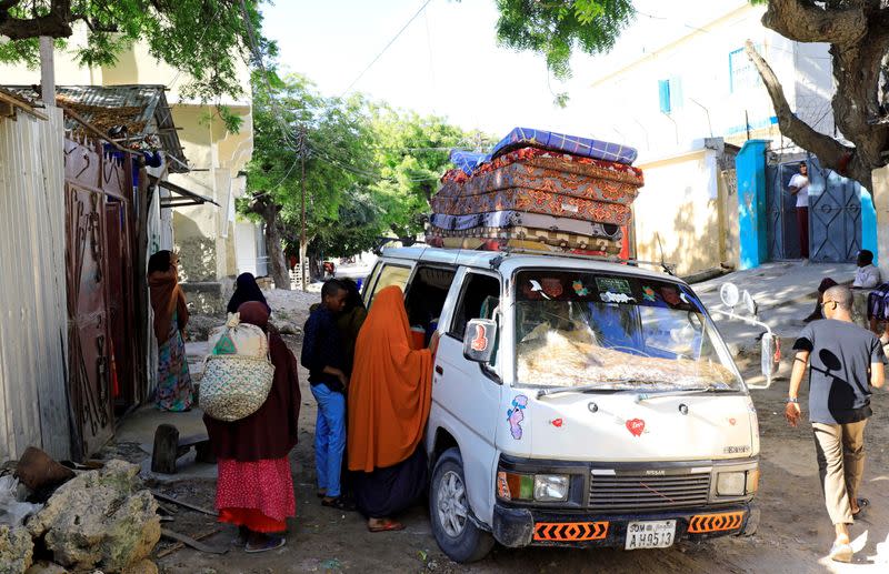 Residents flee following renewed clashes, in Hodan district of Mogadishu