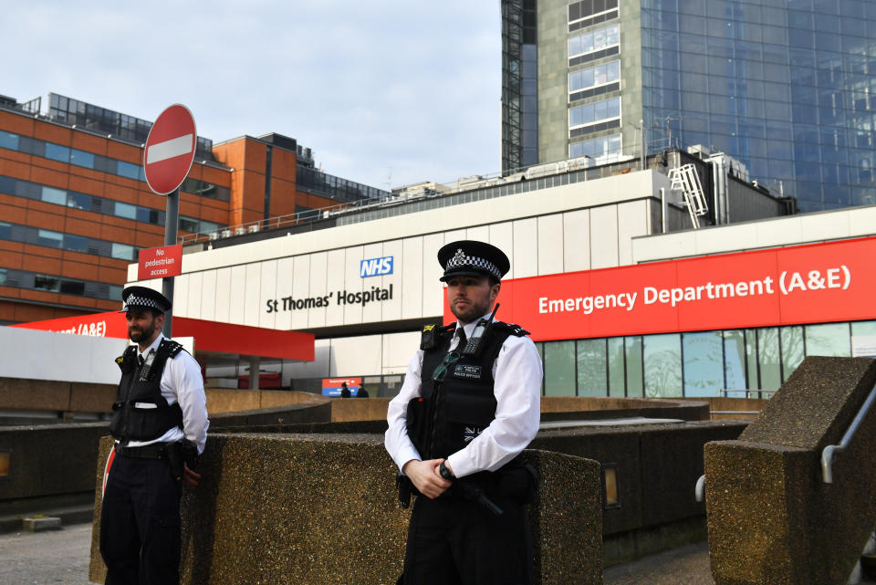 Police officers outside St Thomas' Hospital in Central London, where Prime Minister Boris Johnson remains in intensive care as his coronavirus symptoms persist.