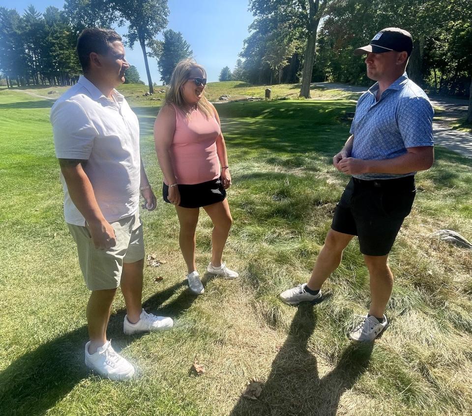 From left, Greg Jouki, Lauren Birkbeck and Patrick Hanlon talk near the fifth green at Tatnuck CC.