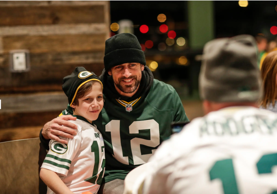 Aaron Rodgers brought cheer to some kids this week. (Packers.com)