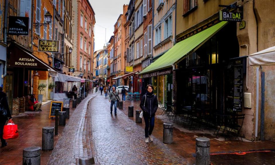 pedestrian street with shops and cafes