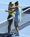 United States' Jennifer Brady, right, is embraced by compatriot Jessica Pegula after winning their quarterfinal match at the Australian Open tennis championship in Melbourne, Australia, Wednesday, Feb. 17, 2021.(AP Photo/Andy Brownbill)