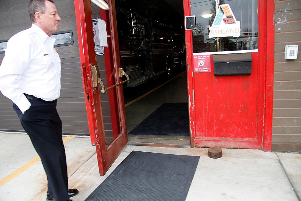 Ashland Fire Chief Rick Anderson explains the need for a new front entrance door since the old metal door expands and contracts with the weather and when it is hot out the door does not close properly shown here on Friday, Jan. 14, 2022. TOM E. PUSKAR/TIMES-GAZETTE.COM