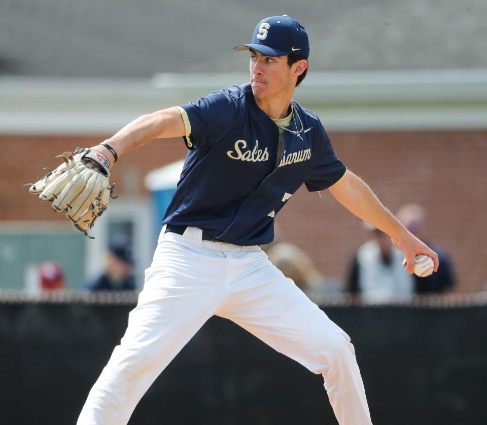 Salesianum's Matthew Speicher throws in relief in the fourth inning of the Bucs' 3-1 win at Caravel Academy, Saturday, March 30, 2024.