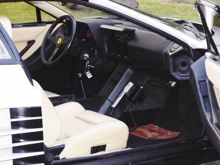 A white Ferrari Testarossa is seen in Miami, Florida, in this December 17, 2014, handout photo provided by Auto Pawn Plus. REUTERS/Auto Pawn Plus/Handout