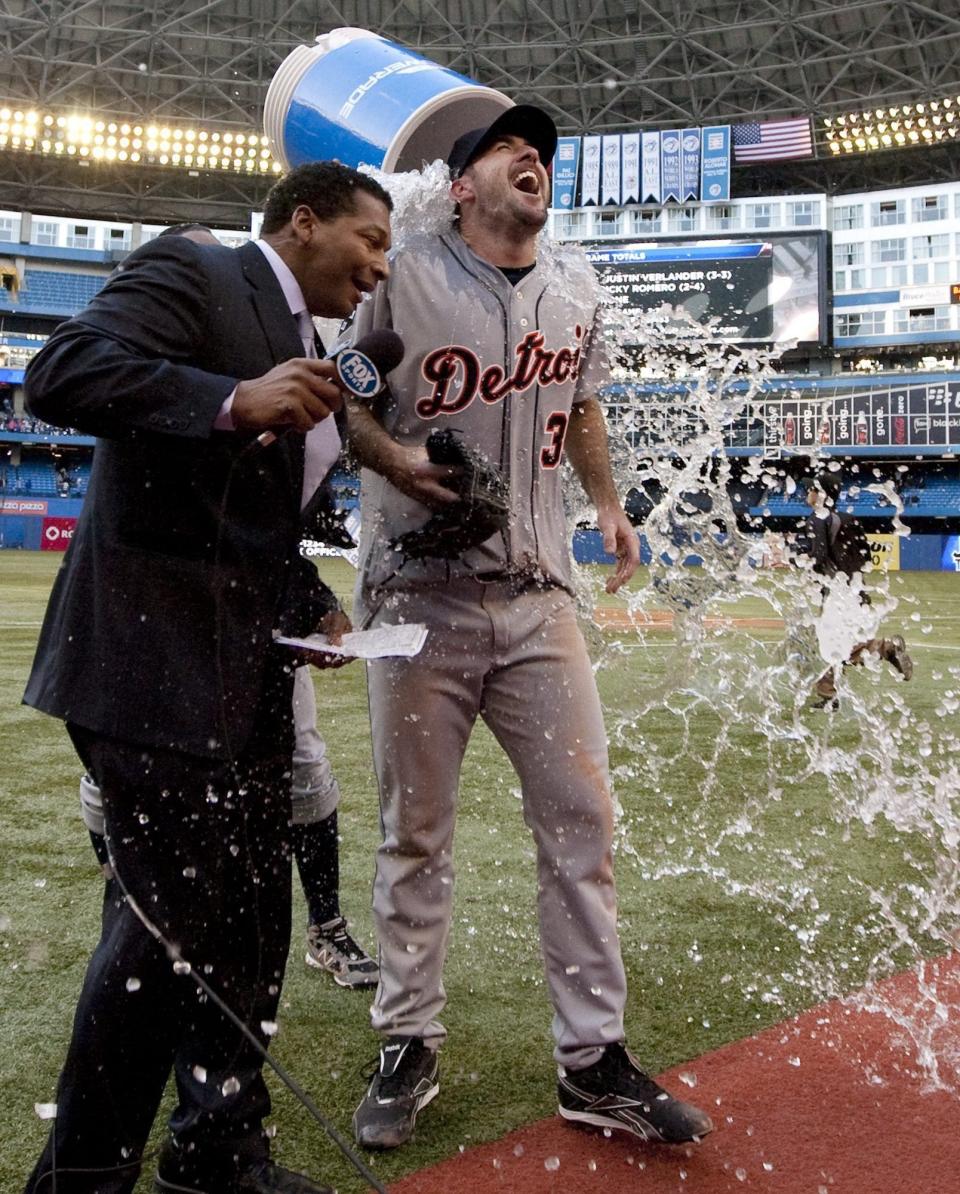 Detroit Tigers pitcher Justin Verlander, right, has water thrown on him after throwing a no-hitter against the Toronto Blue Jays in Toronto on Saturday, May 7, 2011. Verlander had a perfect game going into the eighth inning. He walked J.P. Arencibia with one out in the eighth. (AP Photo/The Canadian Press, Darren Calabrese)