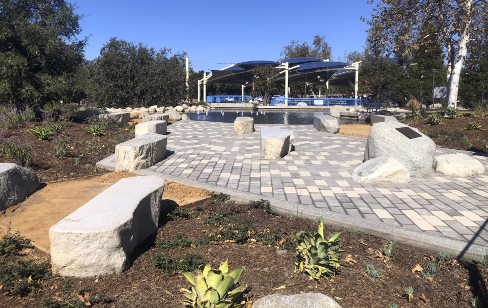 This October 2019 photo provided by Andrew Mooney shows The Healing Garden, a public park memorial to commemorate the 12 people killed in a mass shooting and gun battle at the Borderline Bar & Grill in Thousand Oaks, Calif., a Southern California country-western bar a year earlier. The garden was dedicated Thursday, Nov. 7, 2019, the anniversary of the shooting. (Andrew Mooney via AP)