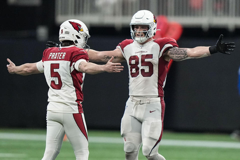 Arizona Cardinals place kicker Matt Prater (5) celebrates a kick with tight end Trey McBride (85) during the second half of an NFL football game against the Atlanta Falcons, Sunday, Jan. 1, 2023, in Atlanta. (AP Photo/Brynn Anderson)