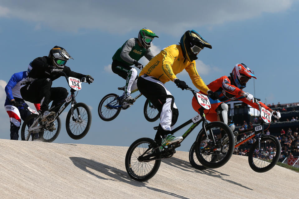 LONDON, ENGLAND - AUGUST 09: Khalen Young (2L) of Australia leads the pack during the Men's BMX Cycling Quarter Finals on Day 13 of the London 2012 Olympic Games at BMX Track on August 9, 2012 in London, England. (Photo by Bryn Lennon/Getty Images)