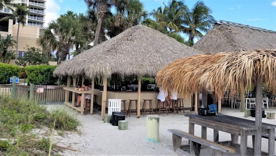 The Lido Key Tiki Bar, located directly behind The Ritz-Carlton Beach Club, is open to the public and starts serving drinks right on the beach daily from 11 a.m. to sunset.