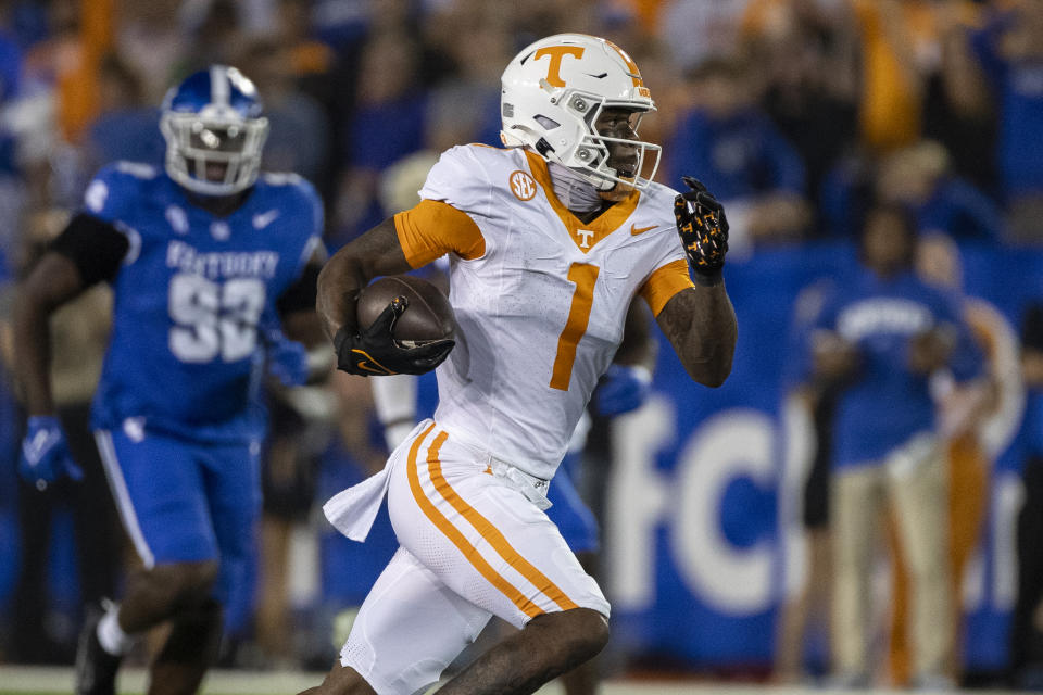 Tennessee wide receiver Dont'e Thornton Jr. (1) runs away from Kentucky pressure during the second half of an NCAA college football game in Lexington, Ky., Saturday, Oct. 28, 2023. (AP Photo/Michelle Haas Hutchins)