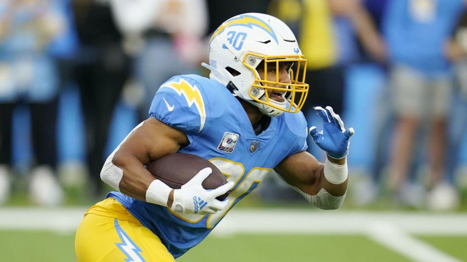 Chargers running back Austin Ekeler carries the ball during a win over the Denver Broncos on Monday.