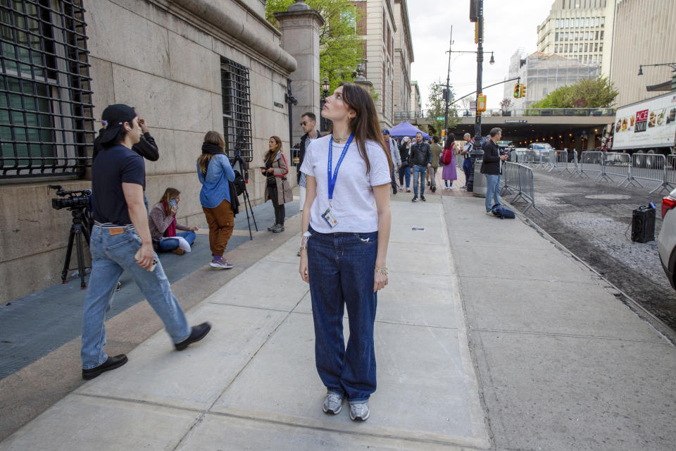 Columbia Journalism School student Cecilia Blotto stands in front of Hamilton Hall on Wednesday, May 1, 2024, in New York, where, hours earlier, New York police burst in to break up a demonstration by protesters who had occupied the building. (AP Photo/Ted Shaffrey)