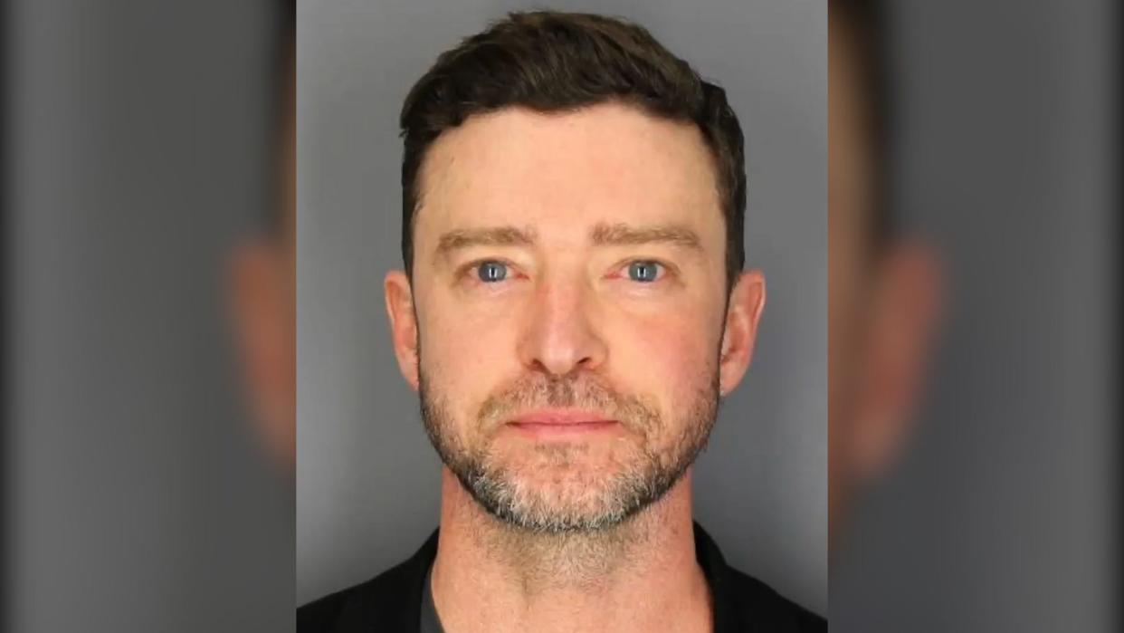 Justin Timberlake, pictured in his June 2024 mugshot for a DWI arrest, is being defended by his lawyer who said he was "not intoxicated."