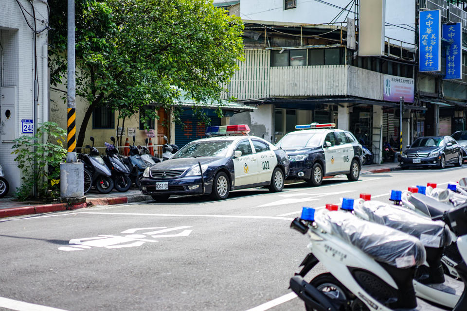 Taipei, Taiwan - 3 Oct, 2017: Taiwan Police cars and motocycle were parking beside the street near police station. They ready to use in duty., Taipei, Taiwan