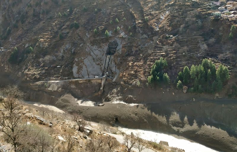 A view of damaged dam after a Himalayan glacier broke and crashed into the dam at Raini Chak Lata