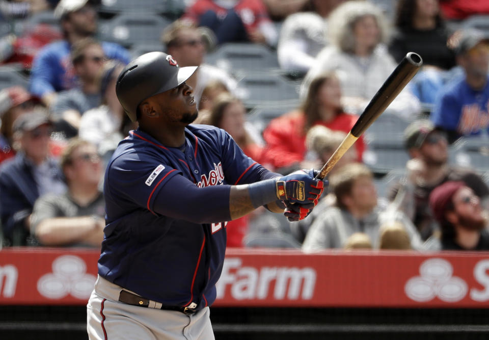 Minnesota Twins' Miguel Sano watches his two-run home run against the Los Angeles Angels during the seventh inning of a baseball game Thursday, May 23, 2019, in Anaheim, Calif. (AP Photo/Marcio Jose Sanchez)