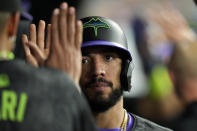 Tampa Bay Rays' Jose Caballero, right, high fives Jose Siri after scoring on a two-ruyn single by Jonny DeLuca off Chicago White Sox pitcher Mike Clevenger during the second inning of a baseball game Monday, May 6, 2024, in St. Petersburg, Fla. (AP Photo/Chris O'Meara)