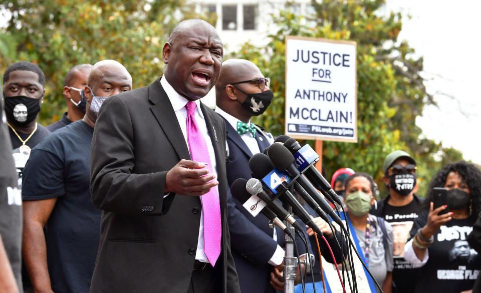 Attorney Ben Crump, who led the legal team for George Floyd's family, gestures while addressing a crowd gathered in front of City Hall in Pasadena, California, on May 17, 2021. People gathered to demand accountability for the Anthony McClain, who was shot in the back by police in Pasadena in August 2020. McClain family dispute the police account of the shooting, alleging that officers "planted" the gun to falsely justify the shooting, and that Anthony McClain was killed "without warning" and "without justification."