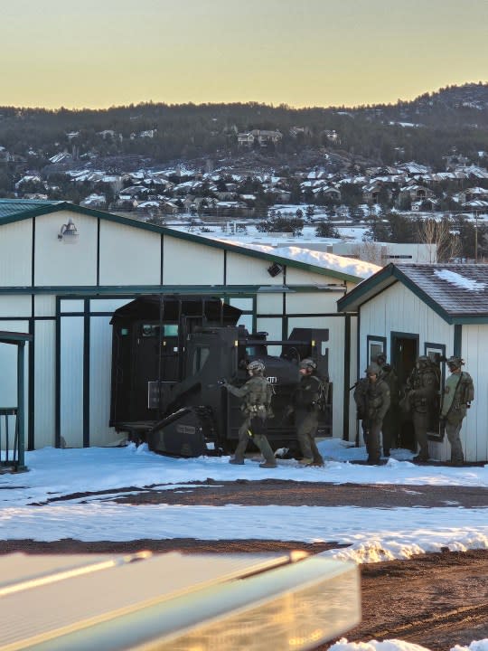 Douglas County SWAT officers respond to a scene to take multiple suspects into custody on March 19, 2024.