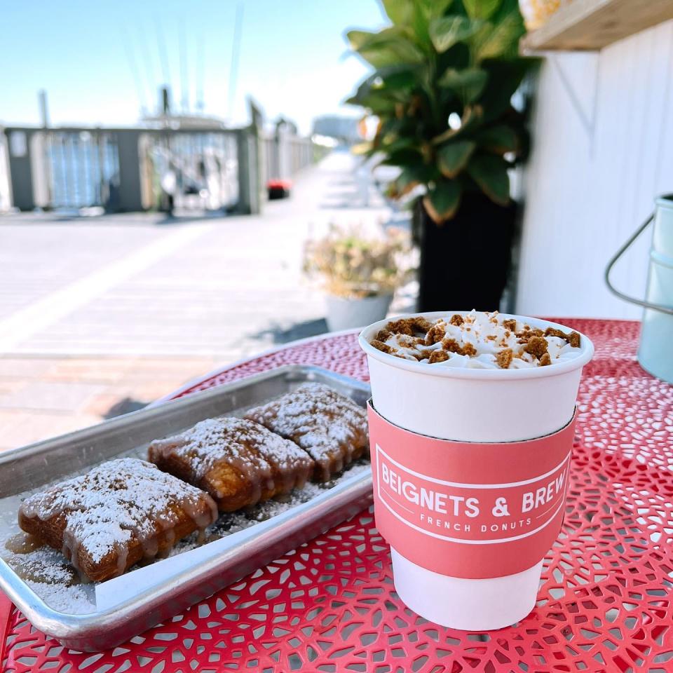 Beignets and Brew is a perfect destination to start your day as you overlook the luckiest fishing village in the world.