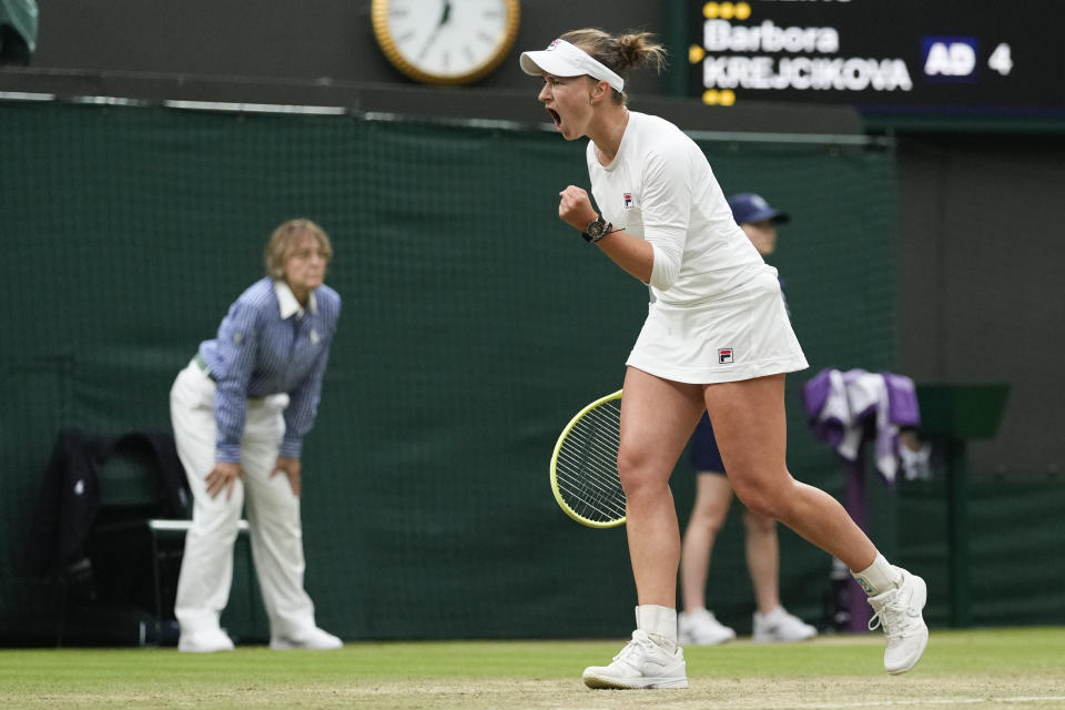 Barbora Krejcikova of the Czech Republic reacts during her fourth round match against Danielle Collins of the United States at the Wimbledon tennis championships in London, Monday, July 8, 2024. (AP Photo/Alberto Pezzali)