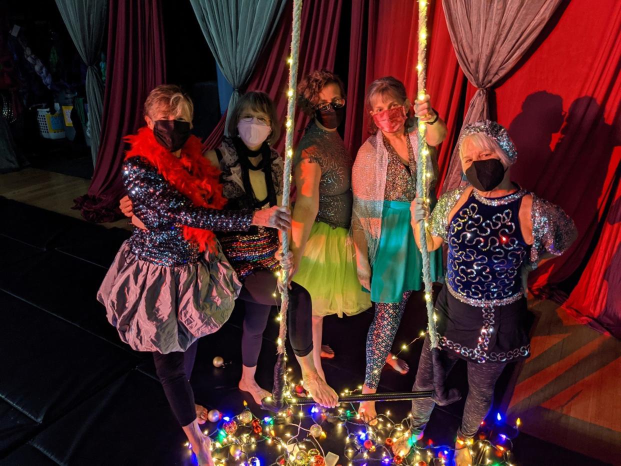 (L-R) Carla Eaton, Emily Carr, Sarah Cook, Linda Gilbert and Sandy Tucker appear in costume for "Holiday Dress-Up Day" at Canopy Studio in Athens, Ga. in Dec. 2021.