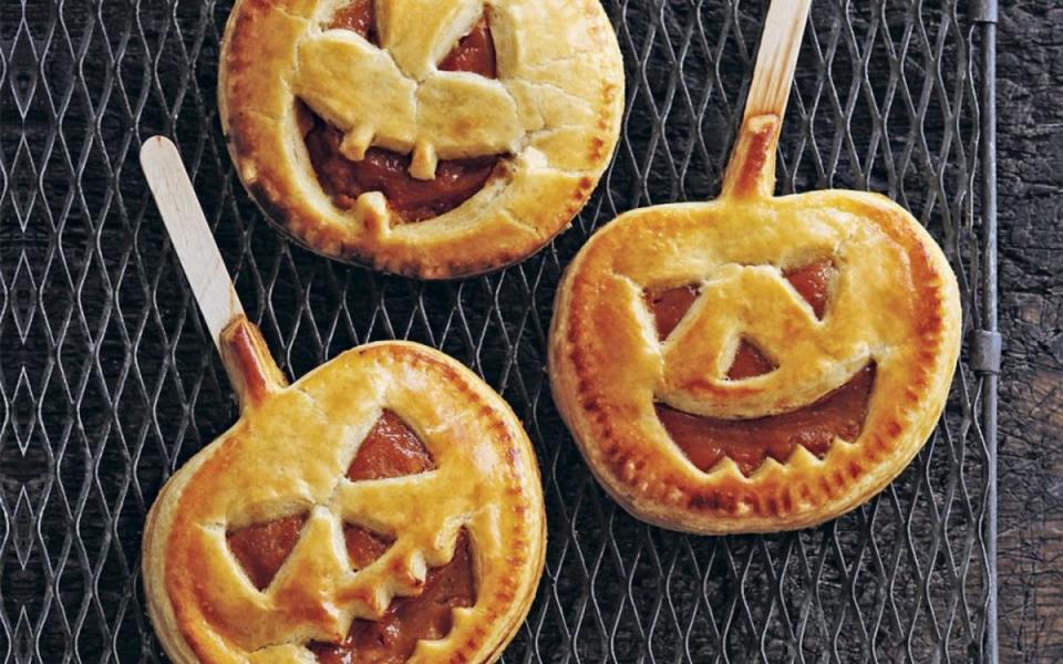 <p>I Heart Pumpkin</p><p>These jack-o’-lantern mini <a href="/1086747/parade/pie-recipes/" data-ylk="slk:pies;elm:context_link;itc:0;sec:content-canvas" class="link ">pies</a> from I Heart Pumpkin are so tasty, with a pumpkin filling flavored with pumpkin pie spice and honey.</p><p><strong>Get the recipe: <a href="/1097273/parade/pumpkin-pie-pops-halloween-recipe/" data-ylk="slk:Pumpkin Pie Pops;elm:context_link;itc:0;sec:content-canvas" class="link ">Pumpkin Pie Pops</a></strong></p>