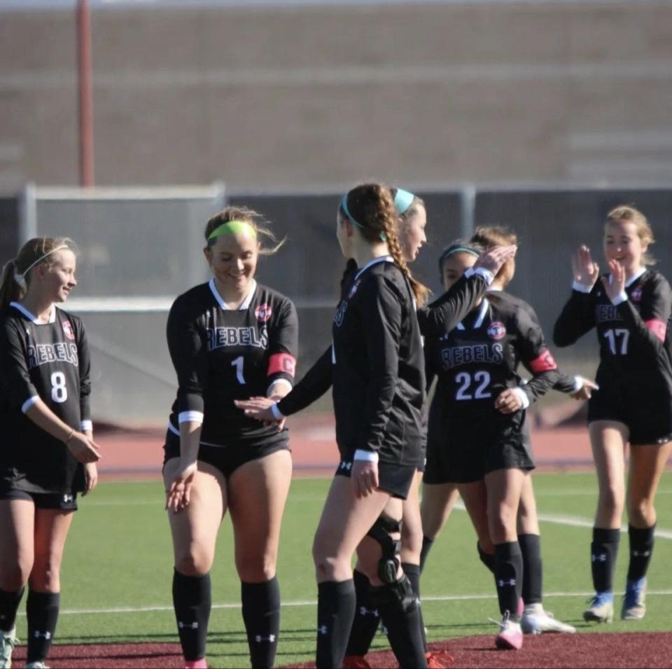 The Tascosa girls soccer team celebrates after scoring a goal during the 2023 season.