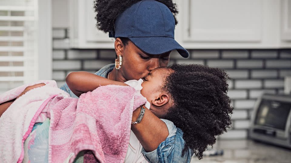 One mother, Latroya, told Faxio that she tells her daughters their hair is "magical... capable of wonderful things." - Tomesha Faxio