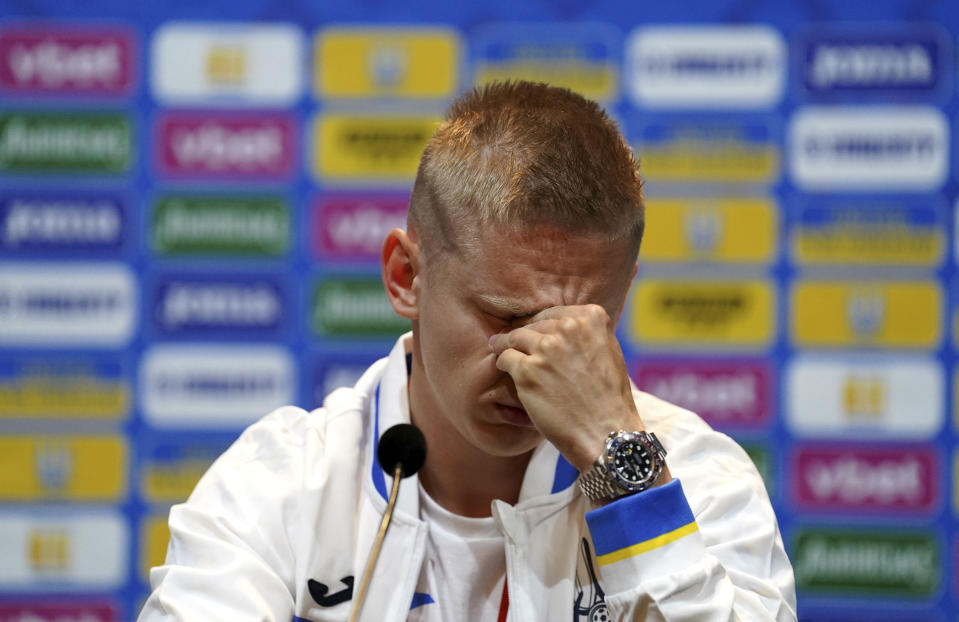 Ukraine's Oleksandr Zinchenko reacts, during a press conference, at Hampden Park, in Glasgow, Scotland, Tuesday May 31, 2022. Scotland will play Ukraine in a World Cup qualifier soccer match on Wednesday. (Andrew Milligan/PA via AP)