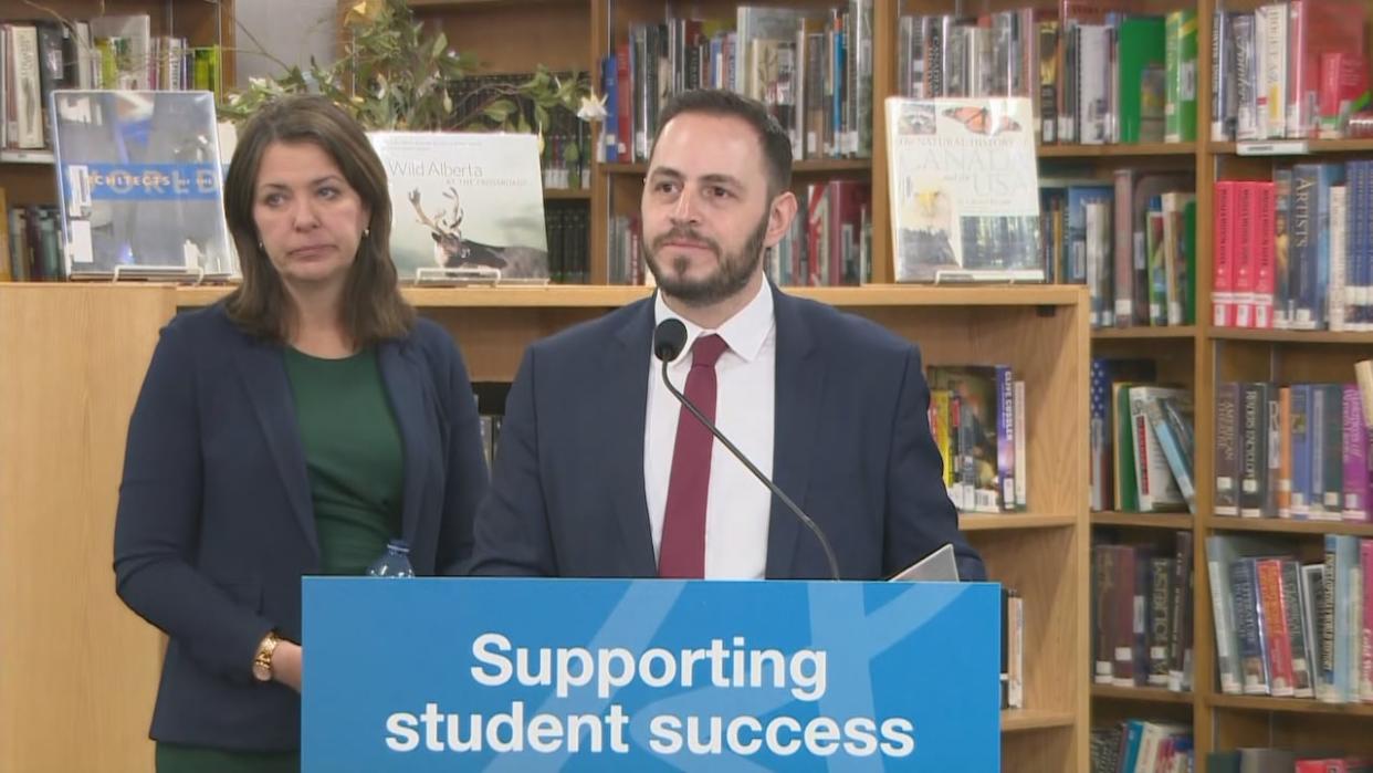 Education Minister Demetrios Nicolaides and Premier Danielle Smith announced new schools set for construction this year and others still in planning during a news conference in Calgary Friday.  (Mike Symington/CBC - image credit)