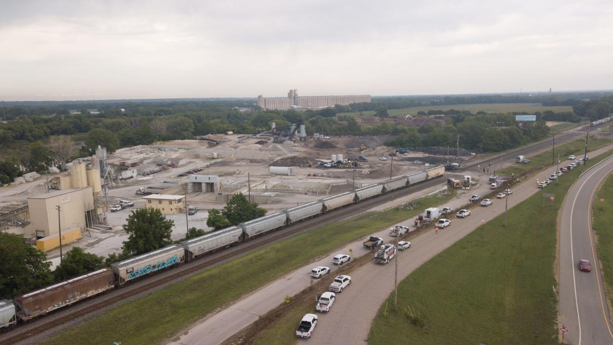 A drone was used to take this photo last July showing the scene where Carl A. Myles, 67, died when an eastbound railroad train struck the cement mixer truck he was driving southbound through a railroad crossing just northeast of the intersection of Interstate 70 and MacVicar Avenue.