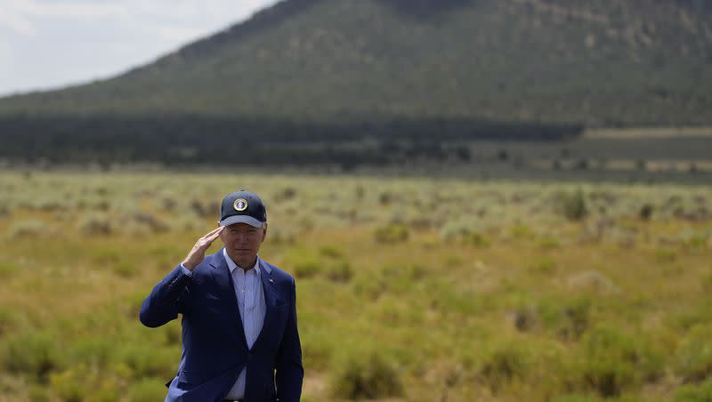 President Joe Biden salutes after speaking where he signed a proclamation designating the Baaj Nwaavjo I’Tah Kukveni National Monument at the Red Butte Airfield on Tuesday, Aug. 8, 2023, in Tusayan, Ariz.