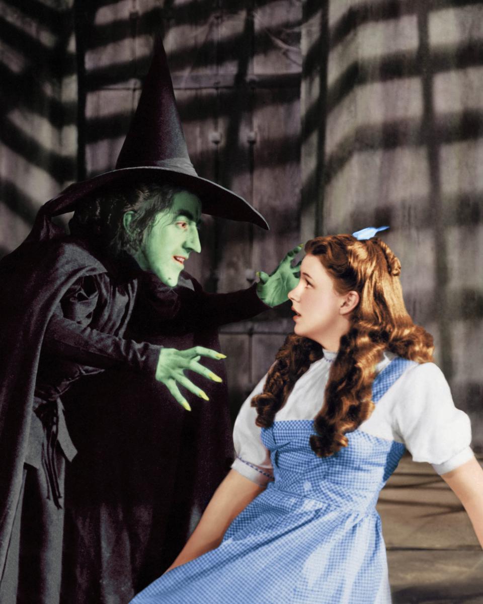 Garland and Margaret Hamilton in <em>The Wizard of Oz</em> in 1939