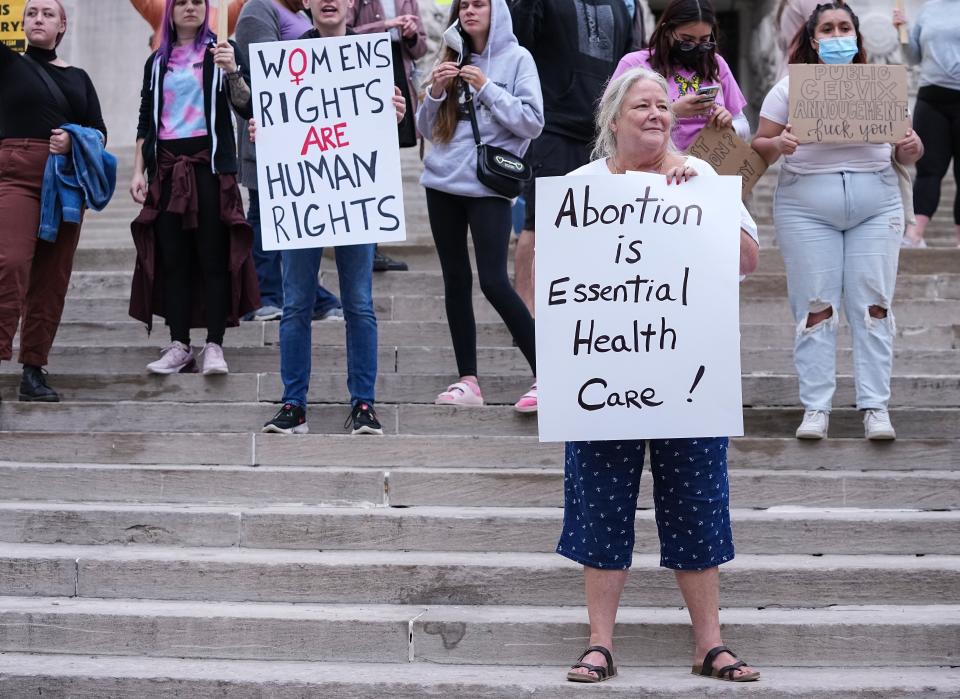 Hoosiers gathered to protest the leaked opinion of the Supreme Court considering overturning the ruling of abortions Tuesday, May 4, 2022, at Monument Circle in Indianapolis. Protestors for abortion-rights were met with counter protesters in favor of overturning Roe v. Wade.