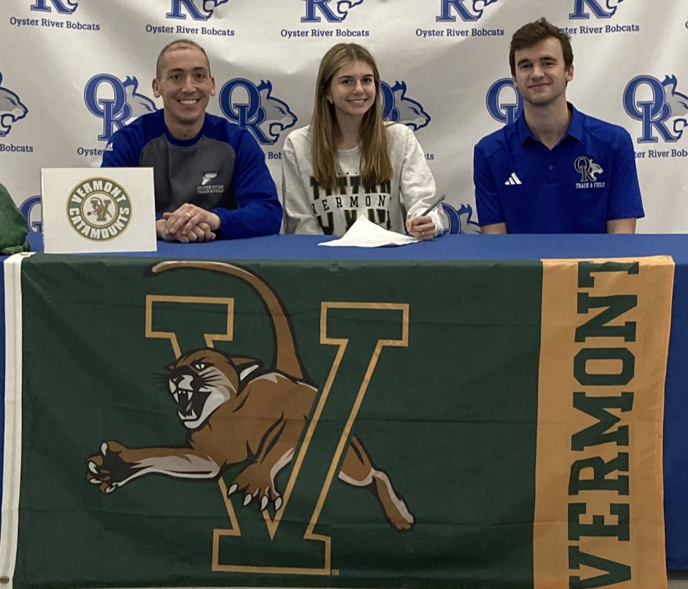 Oyster River High School senior Erin Carty, recently signed her National Letter of Intent to run track and field at the University of Vermont. Carty is seated with Oyster River coaches Nick Ricciardi and Patrick O’Brien.