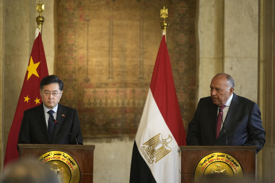Chinese Foreign Minister Qin Gang, left, listens during a press conference with his Egyptian counterpart Sameh Shoukry, at the foreign ministry headquarters in Cairo, Egypt, Sunday, Jan. 15, 2023. (AP Photo/Amr Nabil)