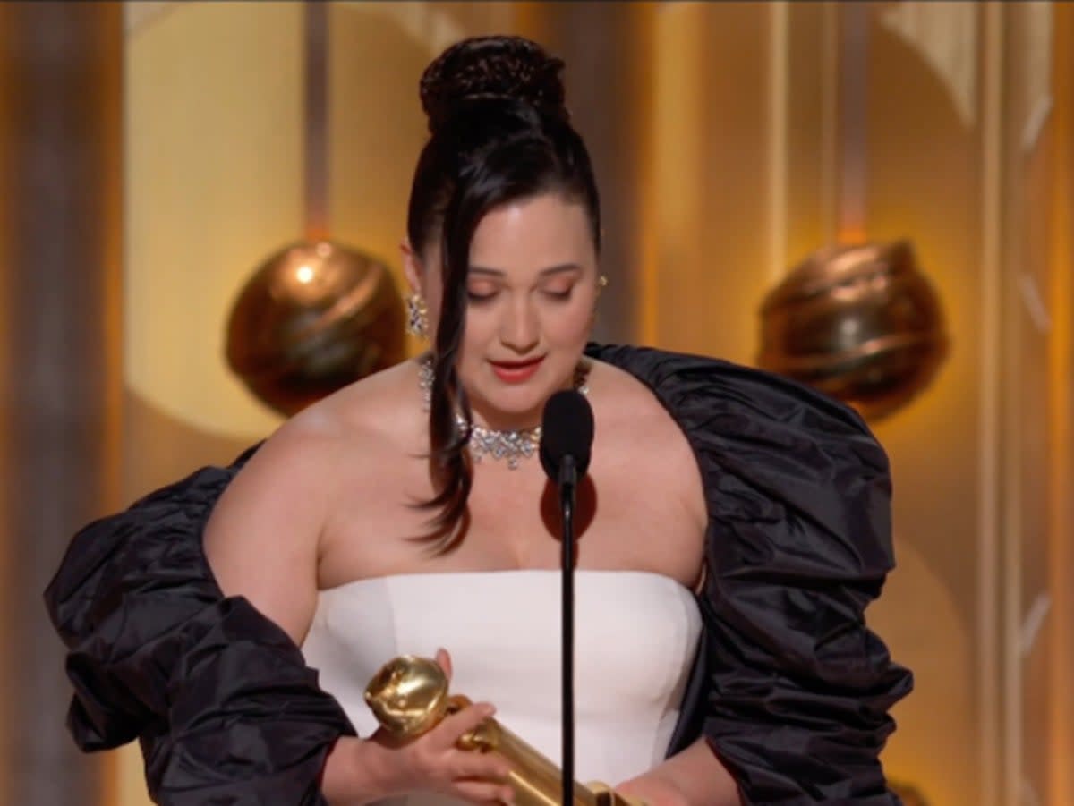 Lily Gladstone accepting her Golden Globe (CBS)