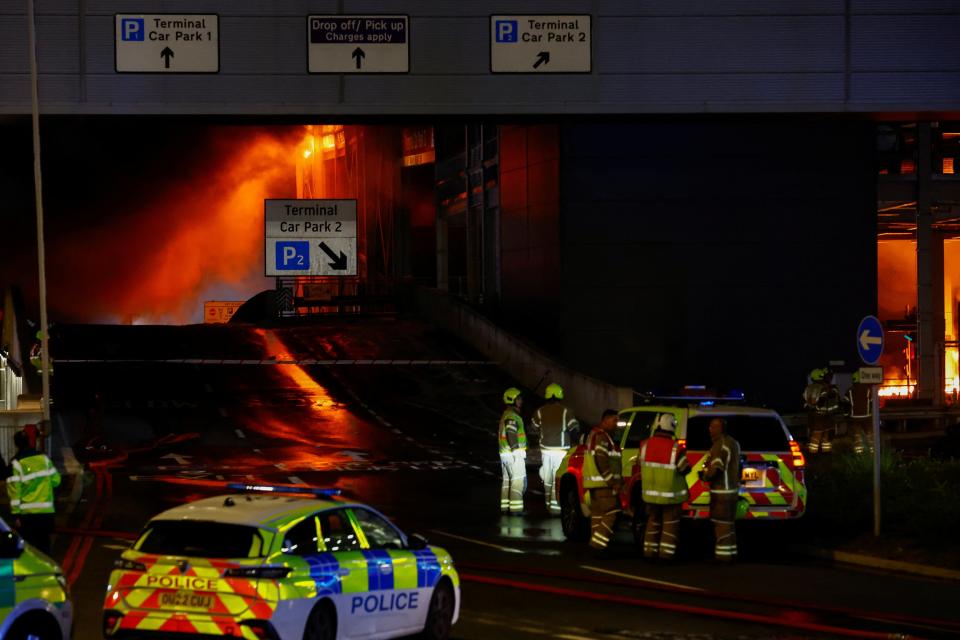 Emergency services respond to a fire in Terminal Car Park 2 at London Luton Airport (REUTERS)