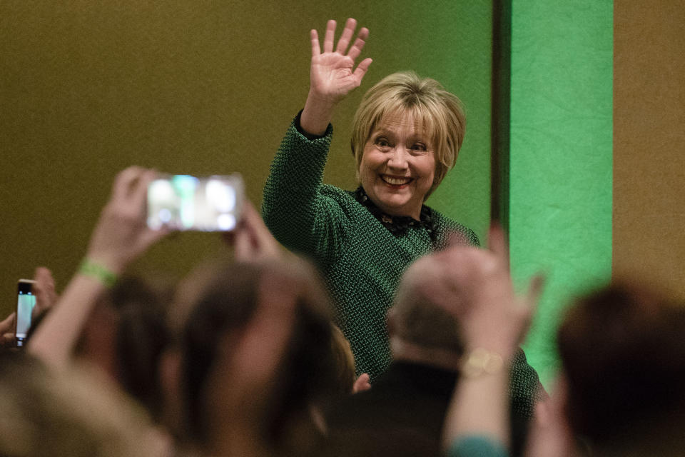 Hillary Clinton waves as she arrives at the Society of Irish Women's annual dinner on St. Patrick's Day in her late father's hometown in Scranton, Pa., Friday, March 17, 2017. (AP Photo/Matt Rourke)