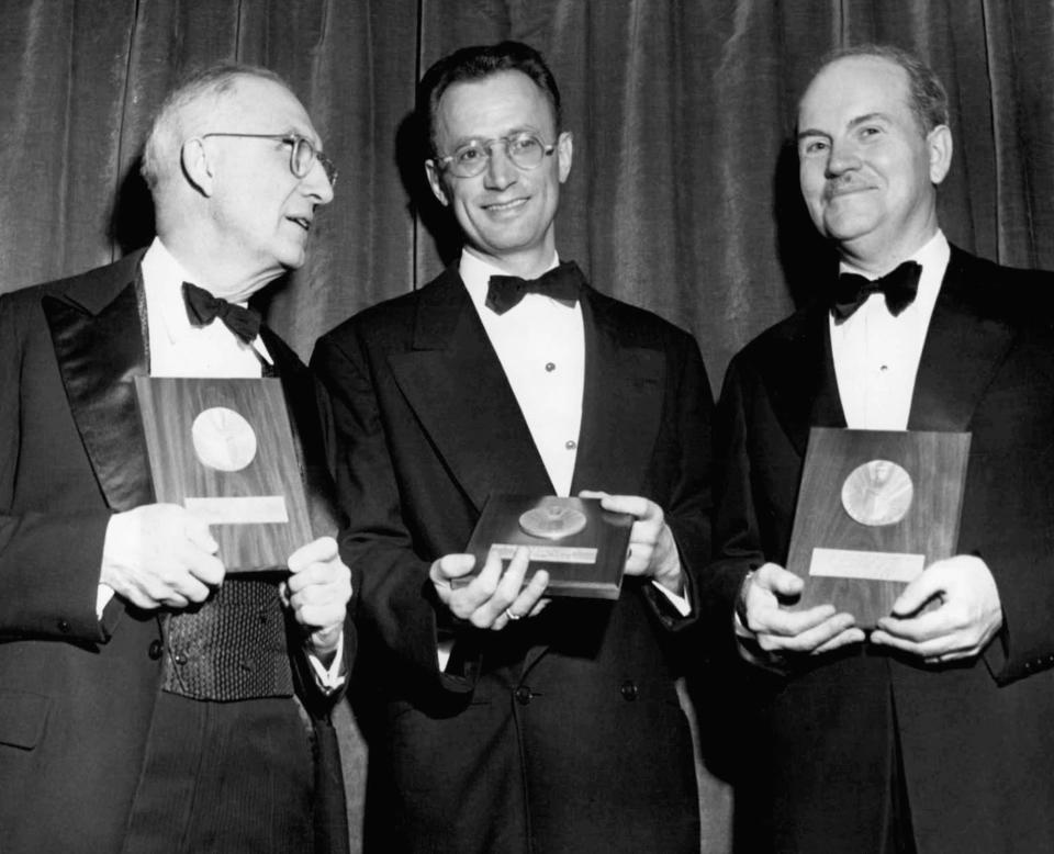 Poet and Rutherford native William Carlos Williams (left) was one of three recipients of the first ever National Book Awards in 1950. He received the honor at New York's Waldorf Astoria along with Nelson Algren (center) and Ralph R. Rusk. A proposal in Rutherford to name a street after an African-American man who inspired one of Williams' most famous poems is in limbo.