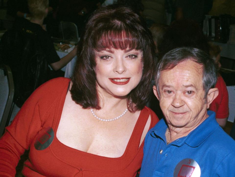 Lisa Loring and Felix Silla, who played Cousin Itt in ‘The Addams Family’, together in 2001 (Getty Images)
