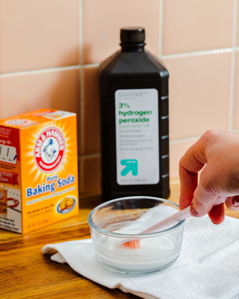 Mixing baking soda + peroxide to make cleaning paste