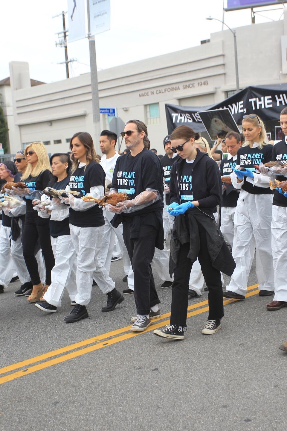 LOS ANGELES, CA - JUNE 02:  Joaquin Phoenix and Rooney Mara participate on National Animal Rights Day on June 2, 2019 at The National Animal Rights Day Demonstration in Los Angeles, California.  (Photo by Hollywood To You/Star Max/GC Images)