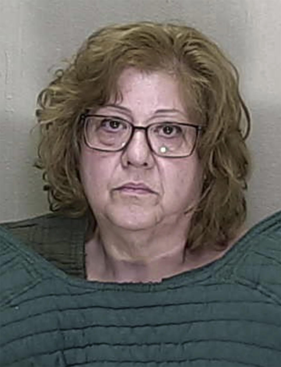 This booking image provided by the Marion County, Fla., Sheriff’s Office shows Susan Louise Lorincz, 58, charged with shooting and killing her Black neighbor. Lorincz, who made her initial appearance in court by video, Thursday, June 8, 2023, has been charged with the first-degree felony of manslaughter with a firearm, as well as culpable negligence, battery and two counts of assault. (Marion County Sheriff’s Office via AP)