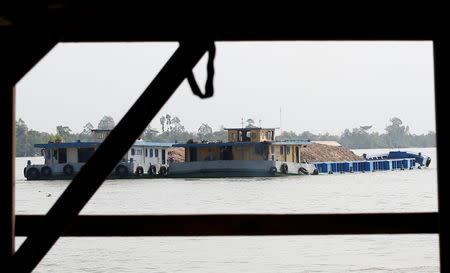 Ships transport sand on Mekong river in Can Tho city, Vietnam December 17, 2018. Picture taken December 17, 2018. REUTERS/Kham