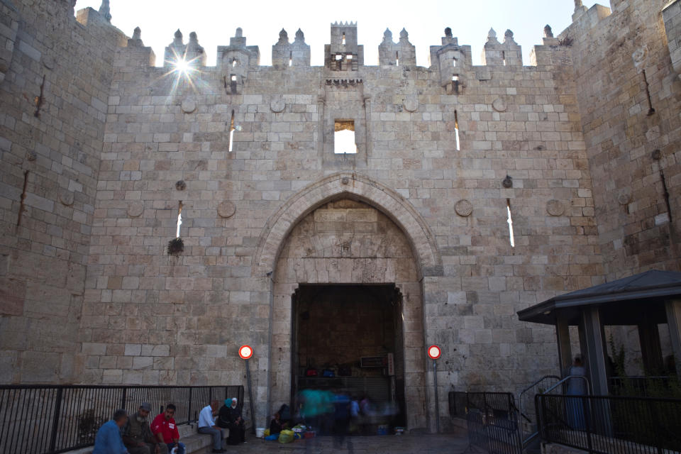 People are seen near Damascus Gate in Jerusalem's Old City. (Photo: Nir Elias/Reuters)