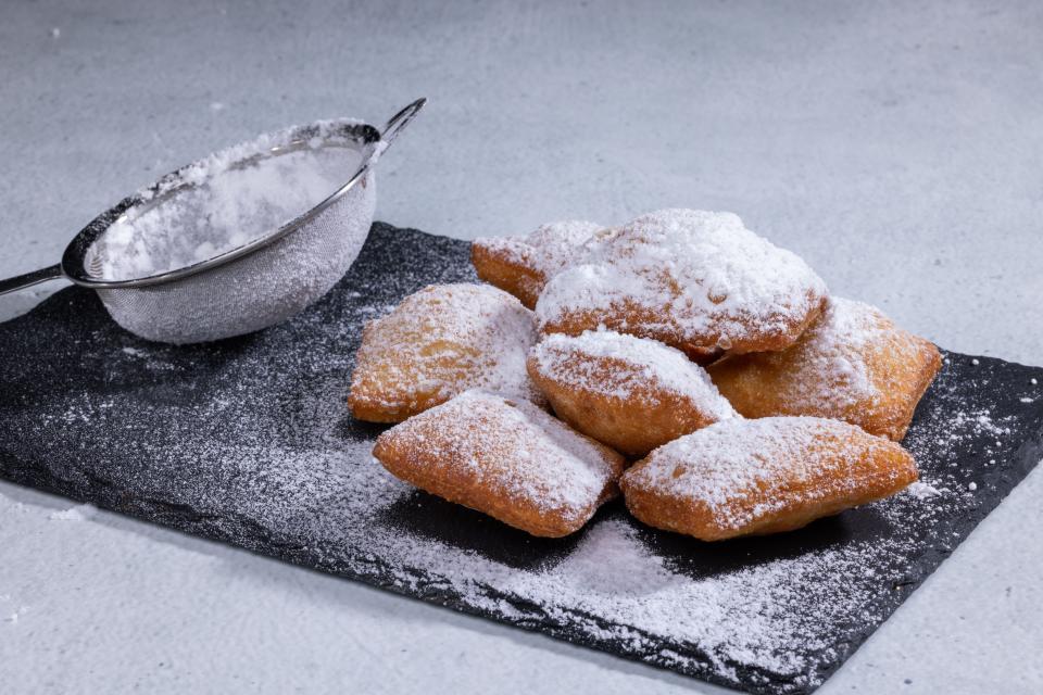 Universal Orlando guests can try New Orleans-style beignets during the resort's Mardi Gras celebration.